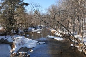 12665055-a-very-cold-looking-river-on-a-winter-day-in-andover-maine